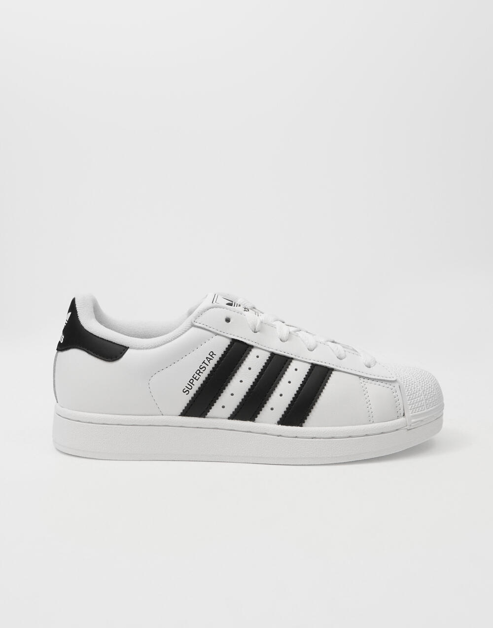 white adidas with black stripes on one side