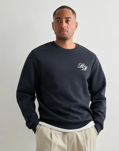 Blå sweatshirt från Les Deux med rund hals och print på bröstet