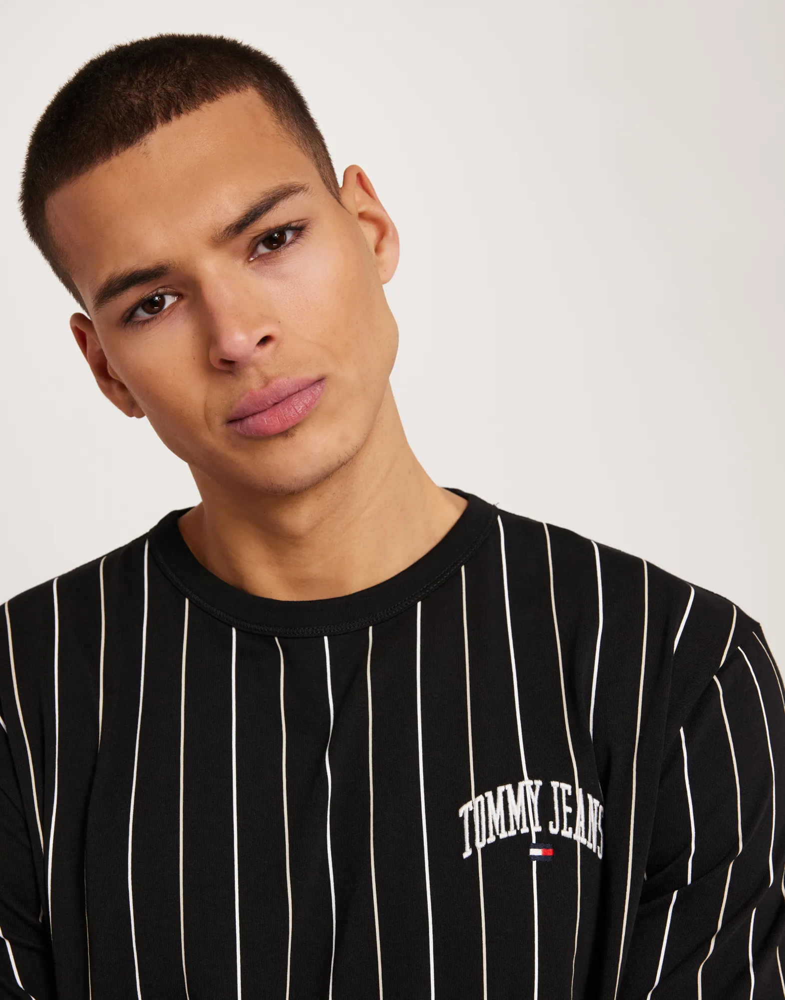 TJM REG VARSITY PINSTRIPE TEE