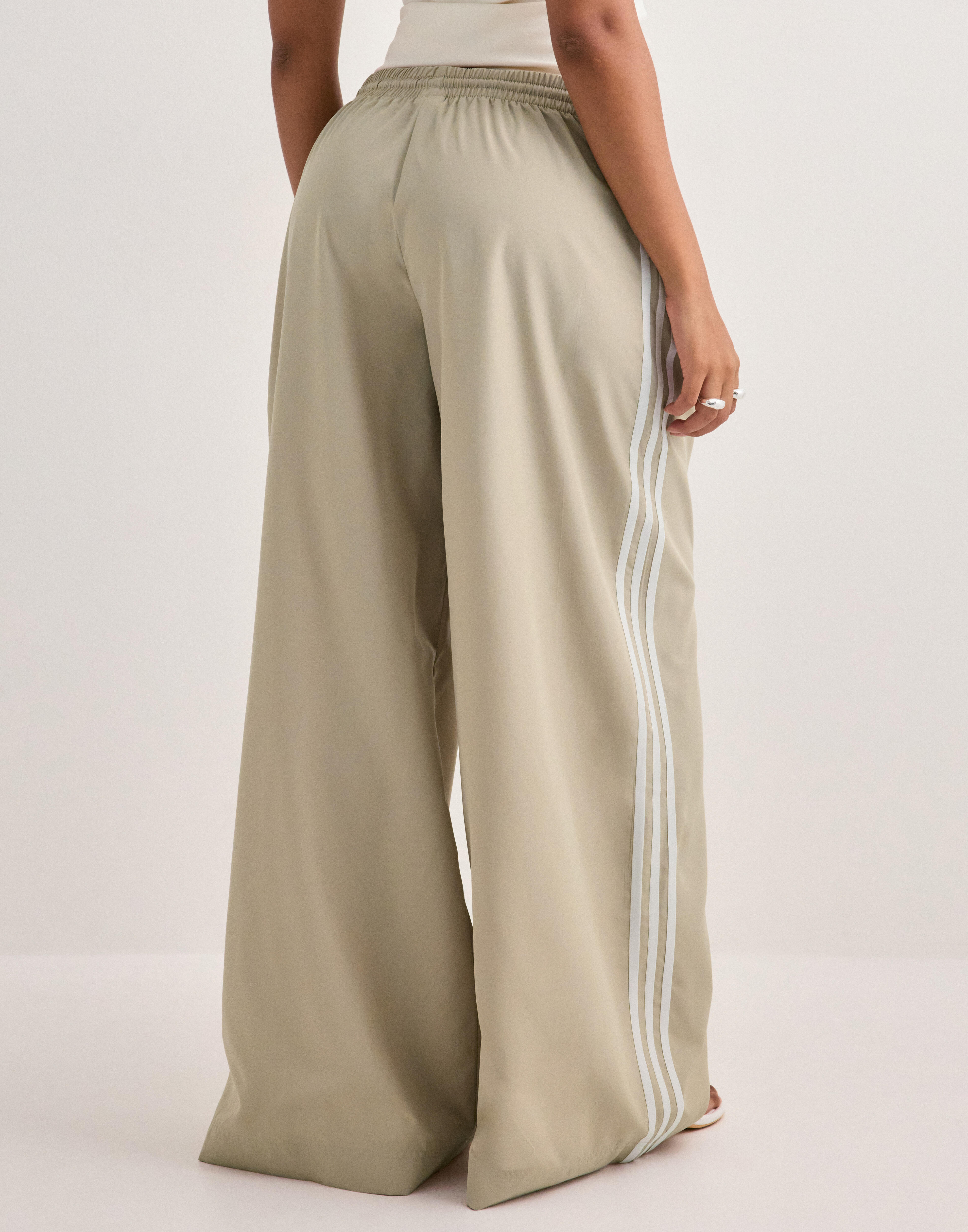 Adidas originals firebird tp i — byxor med fickor från Nelly