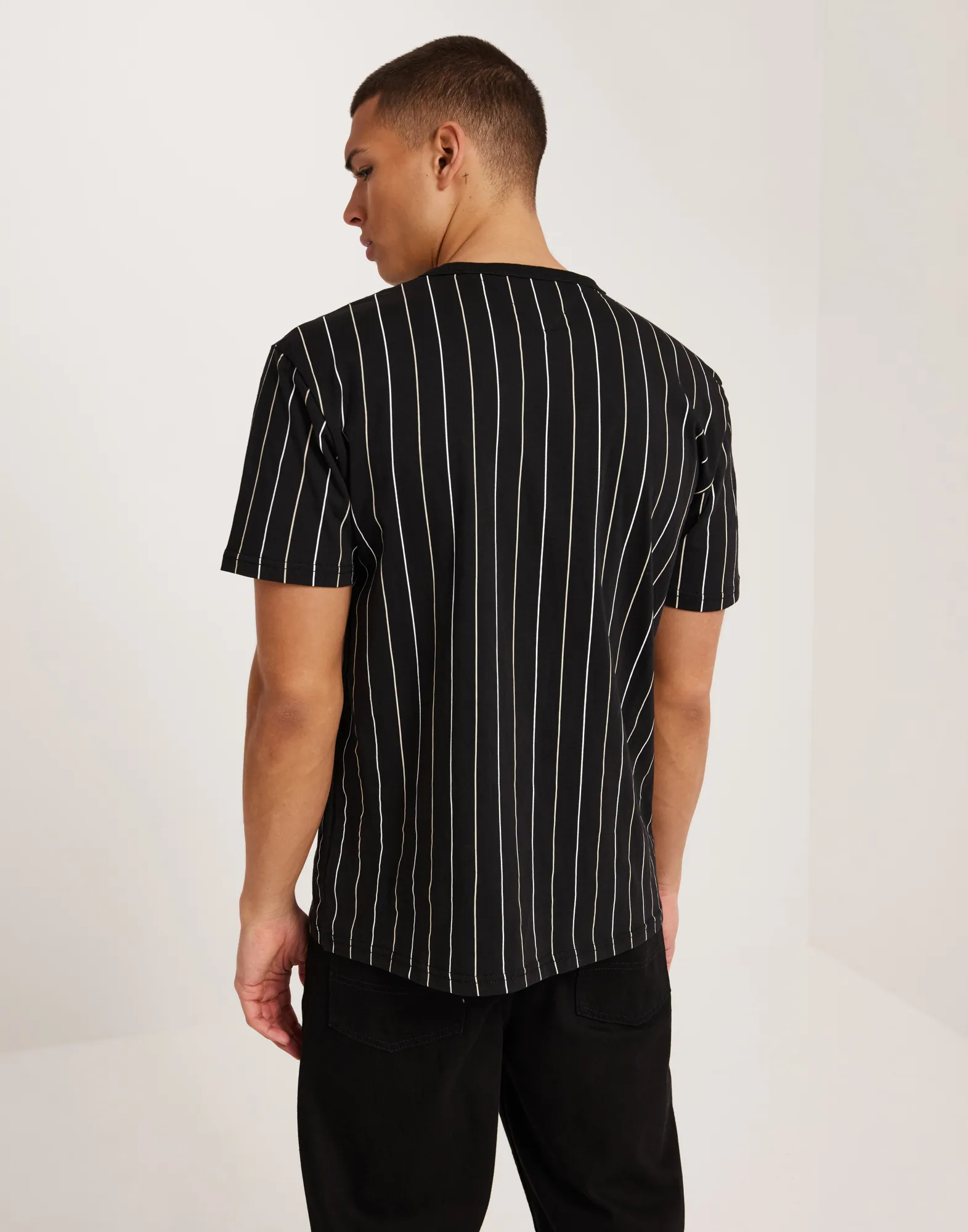 TJM REG VARSITY PINSTRIPE TEE