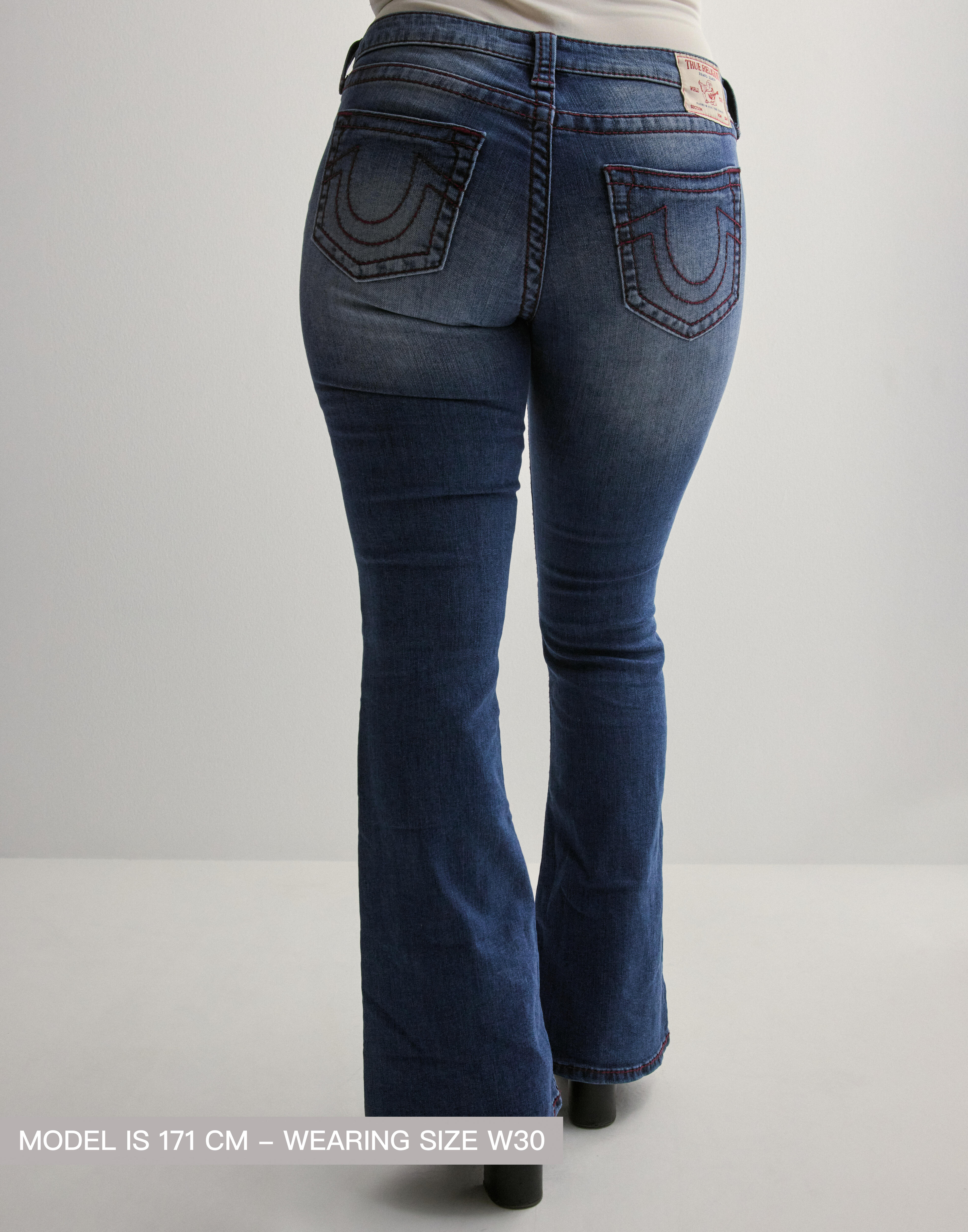 Buy True Religion NELLY ULTRA LOW RISE JOEY FLARE BIG T - | Nelly.com