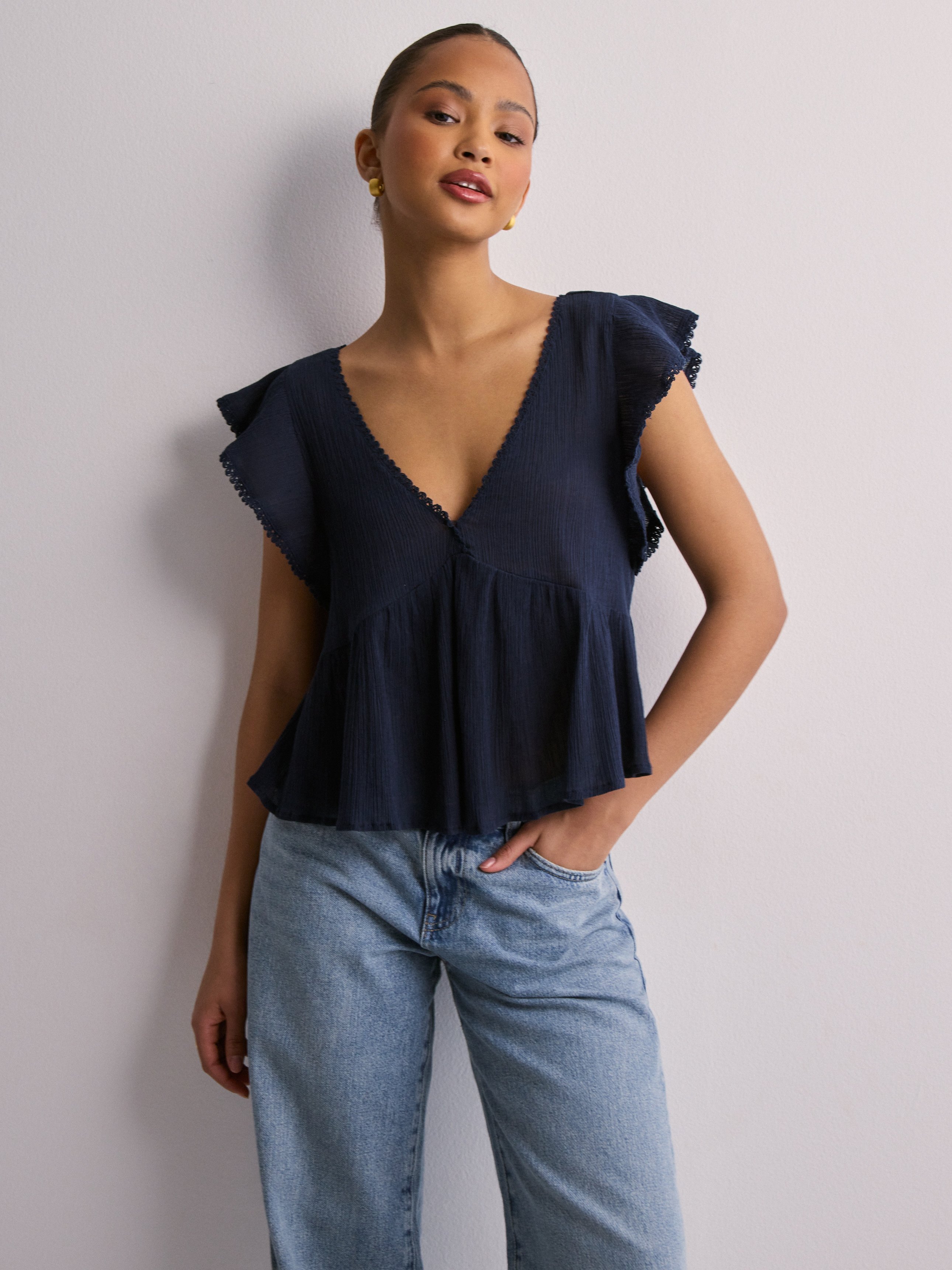 Cute navy tops on sale