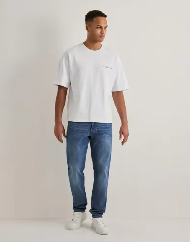 Diesel 1986 Larkee-Beex Slim fit jeans Blå