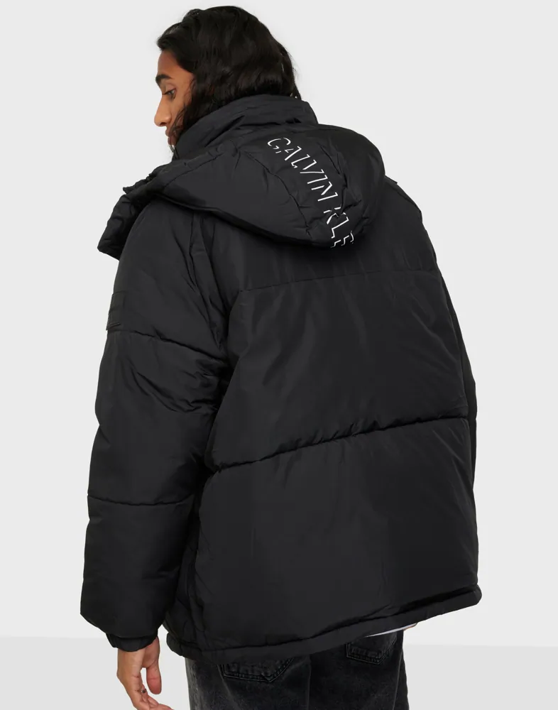 Buy Calvin Klein Jeans BLOCKING HOODED SHORT PUFFER Black NLYMAN