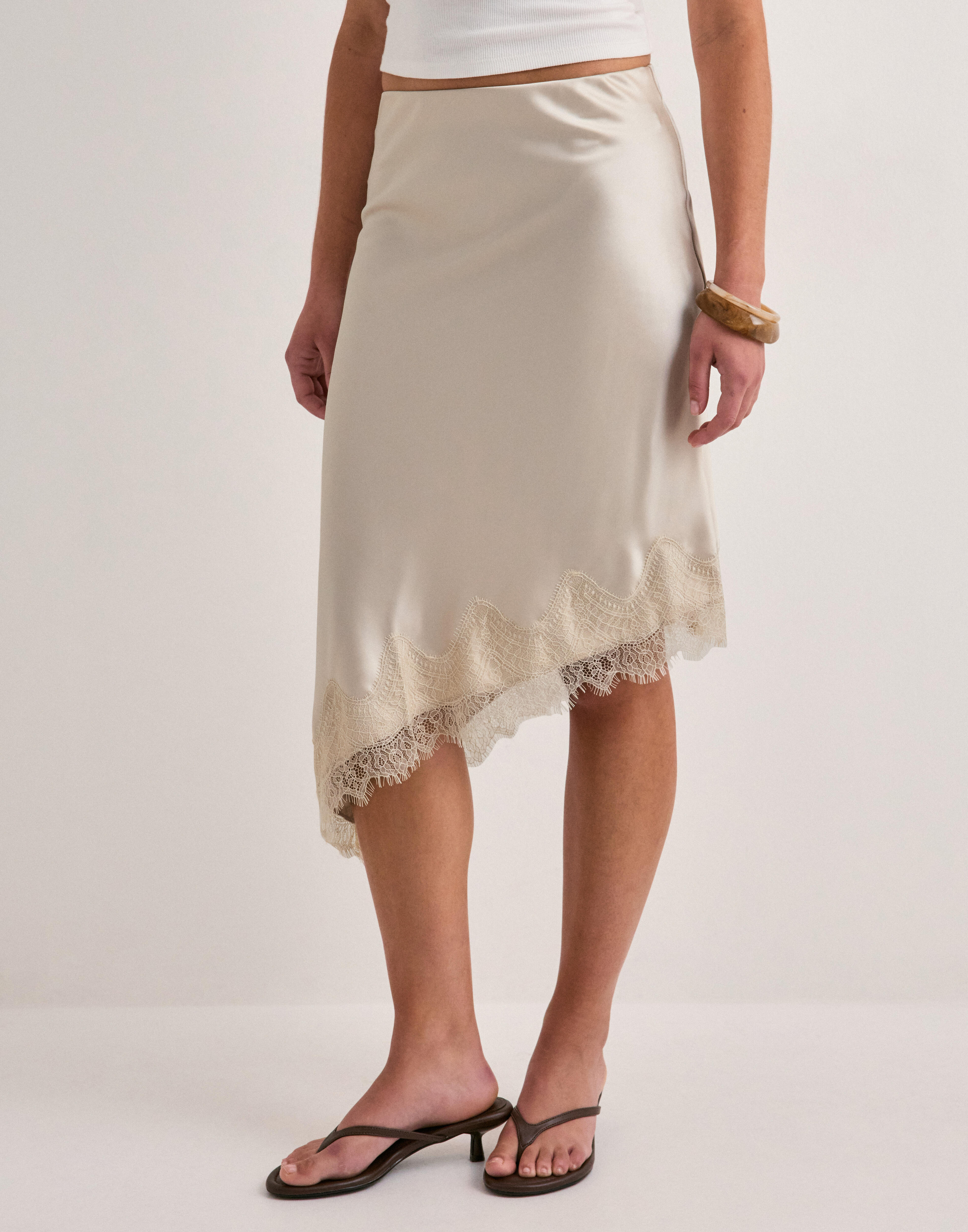 Buy Only ONLFARAYA SATIN LACE SKIRT WVN - Oatmeal | Nelly.com