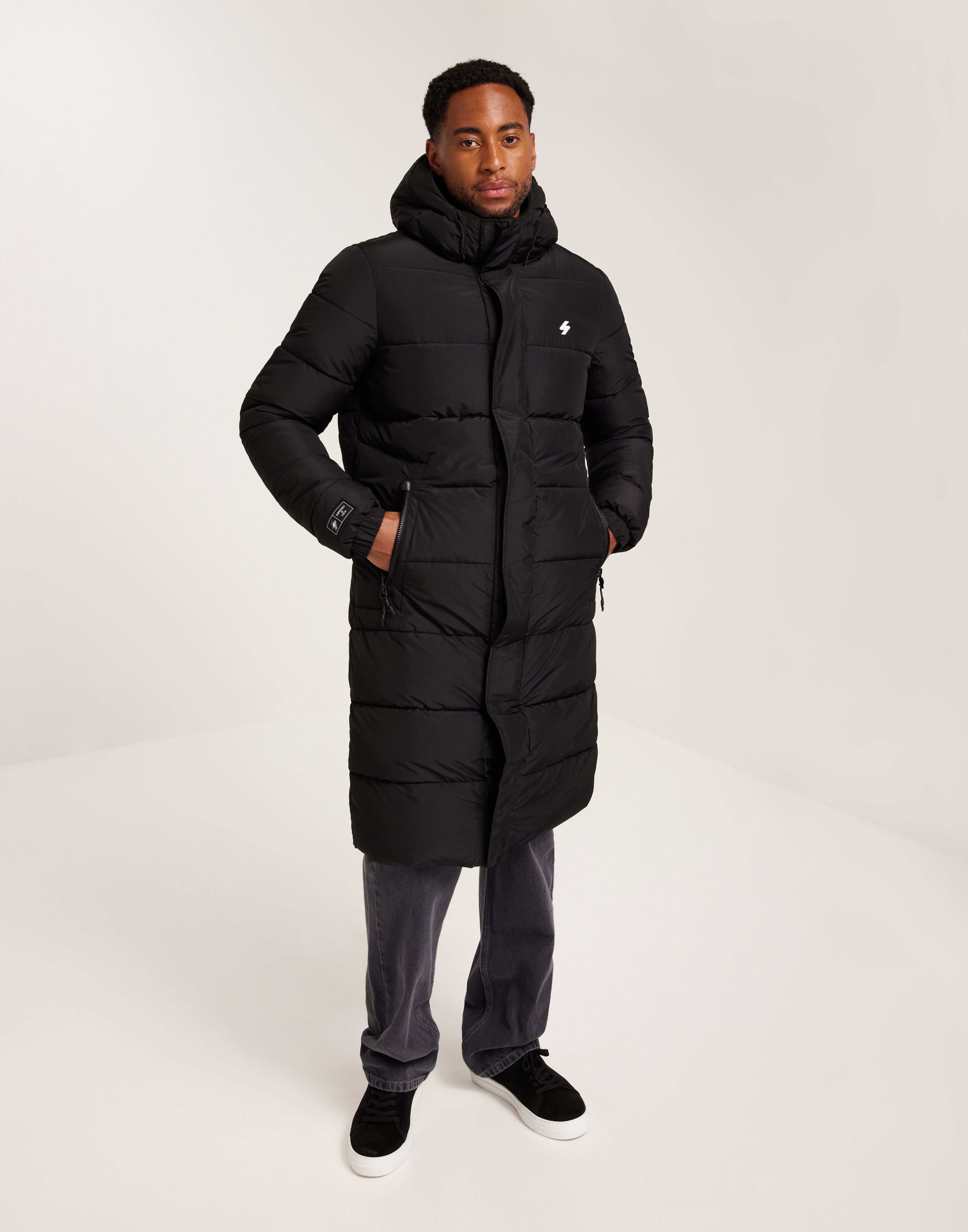 Buy Superdry HOODED LONGLINE SPORTS PUFFER Black NLYMAN