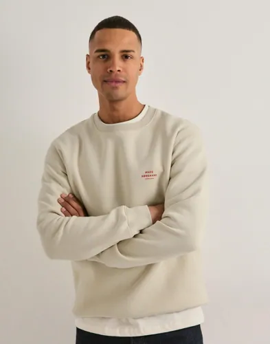Mads Nørgaard Standard Crew sweatshirt i beige med rundad hals och logga
