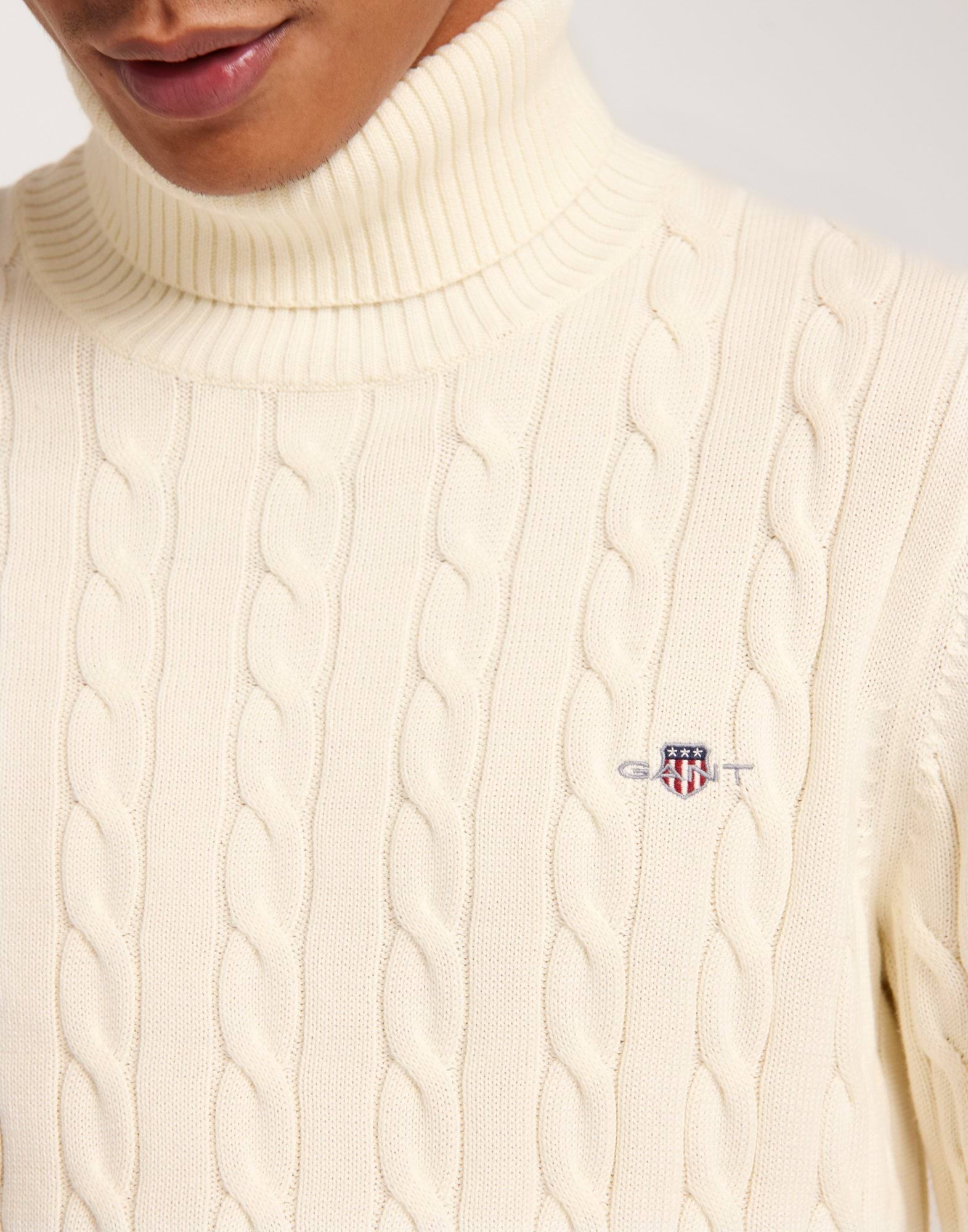 COTTON CABLE TURTLE NECK