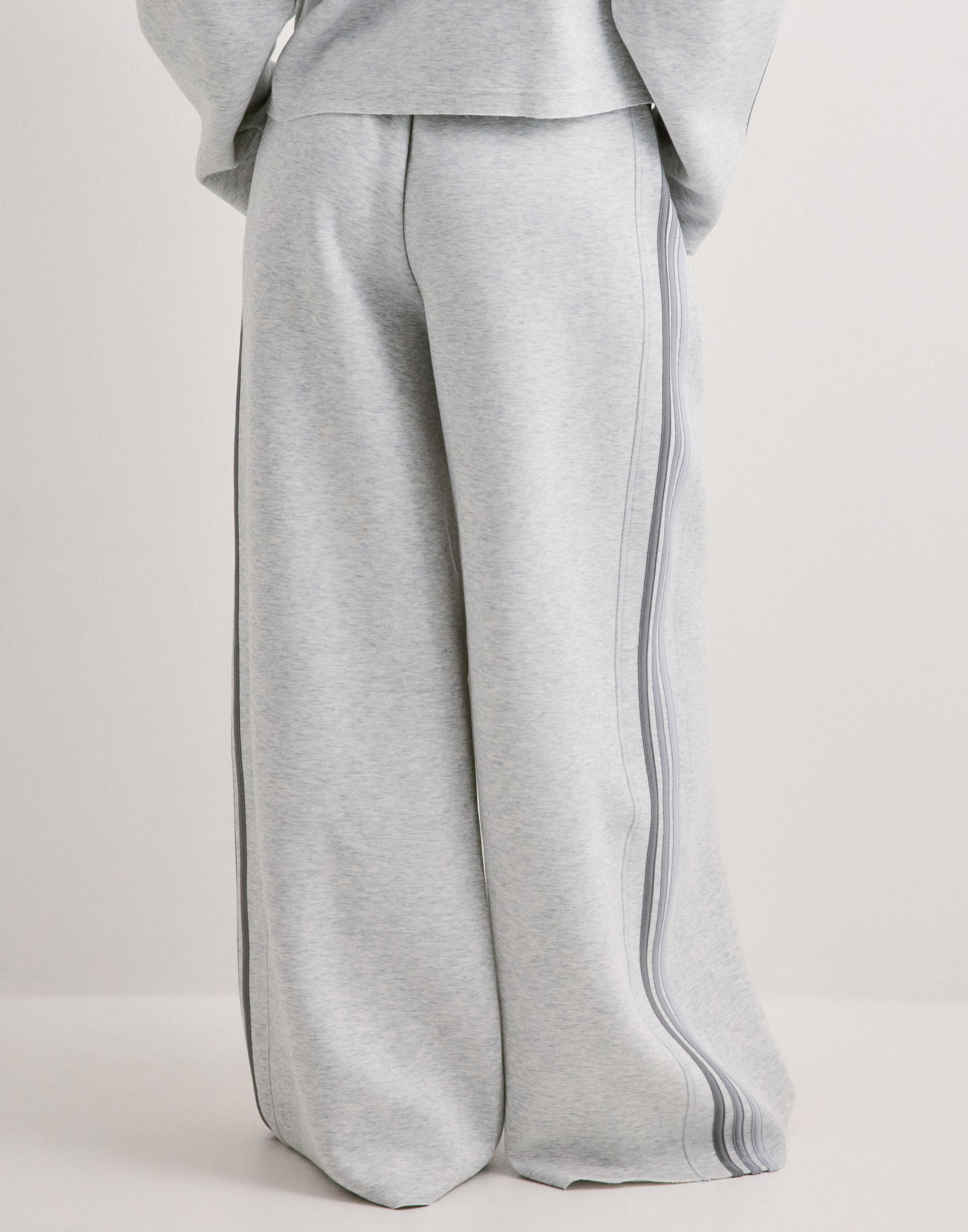 Adidas originals sst lng tp i — byxor med fickor från Nelly