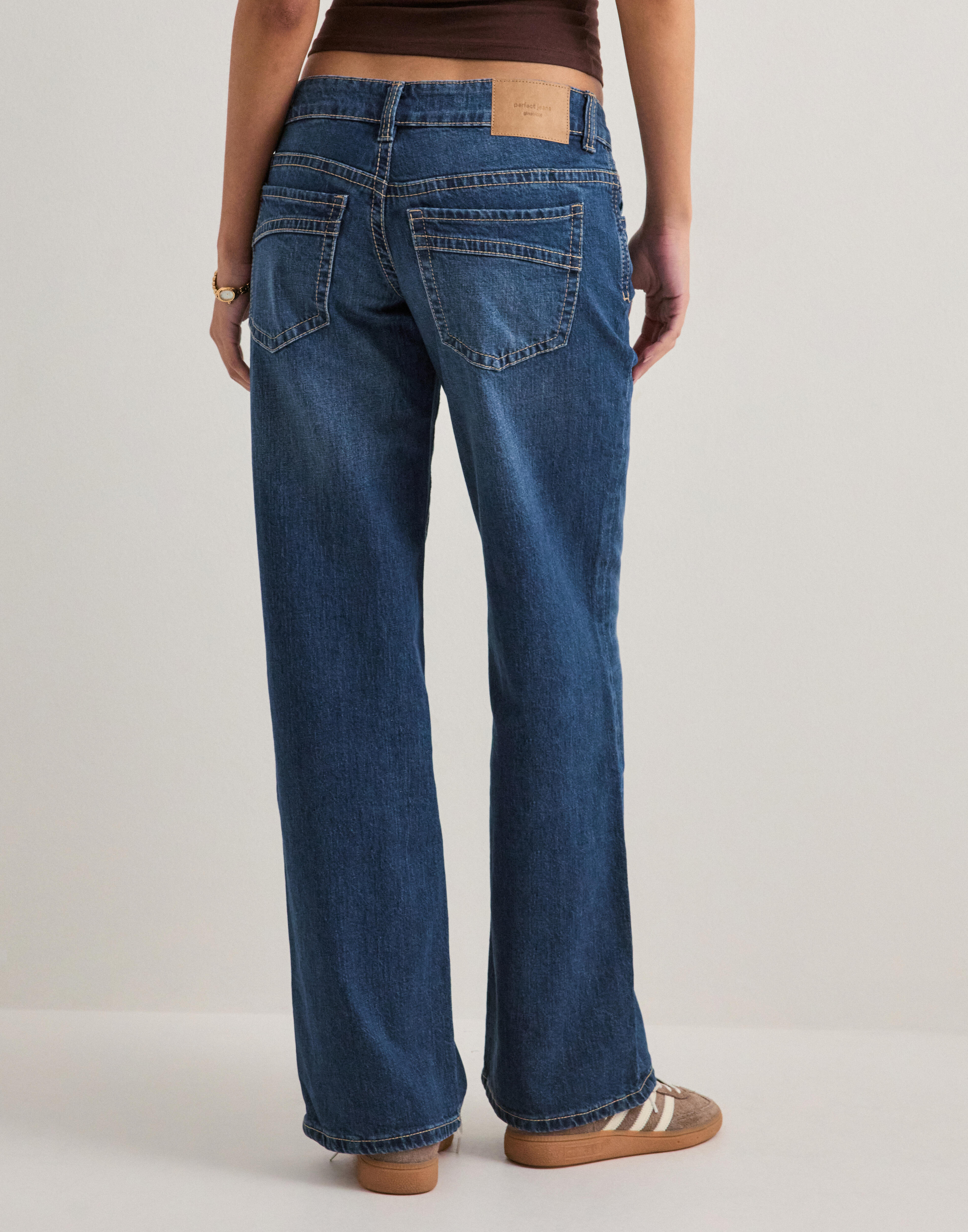 Buy Gina Tricot Ultra low wide jeans - Dark Blue | Nelly.com