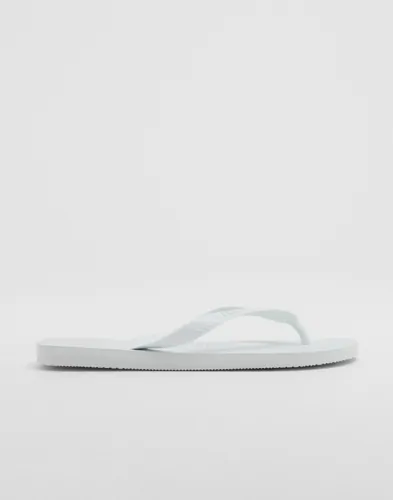 Vita flip-flops från Havaianas med logga på fotremmen
