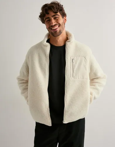 Beige teddyjacka från Jack & Jones med dragkedja och bröstficka