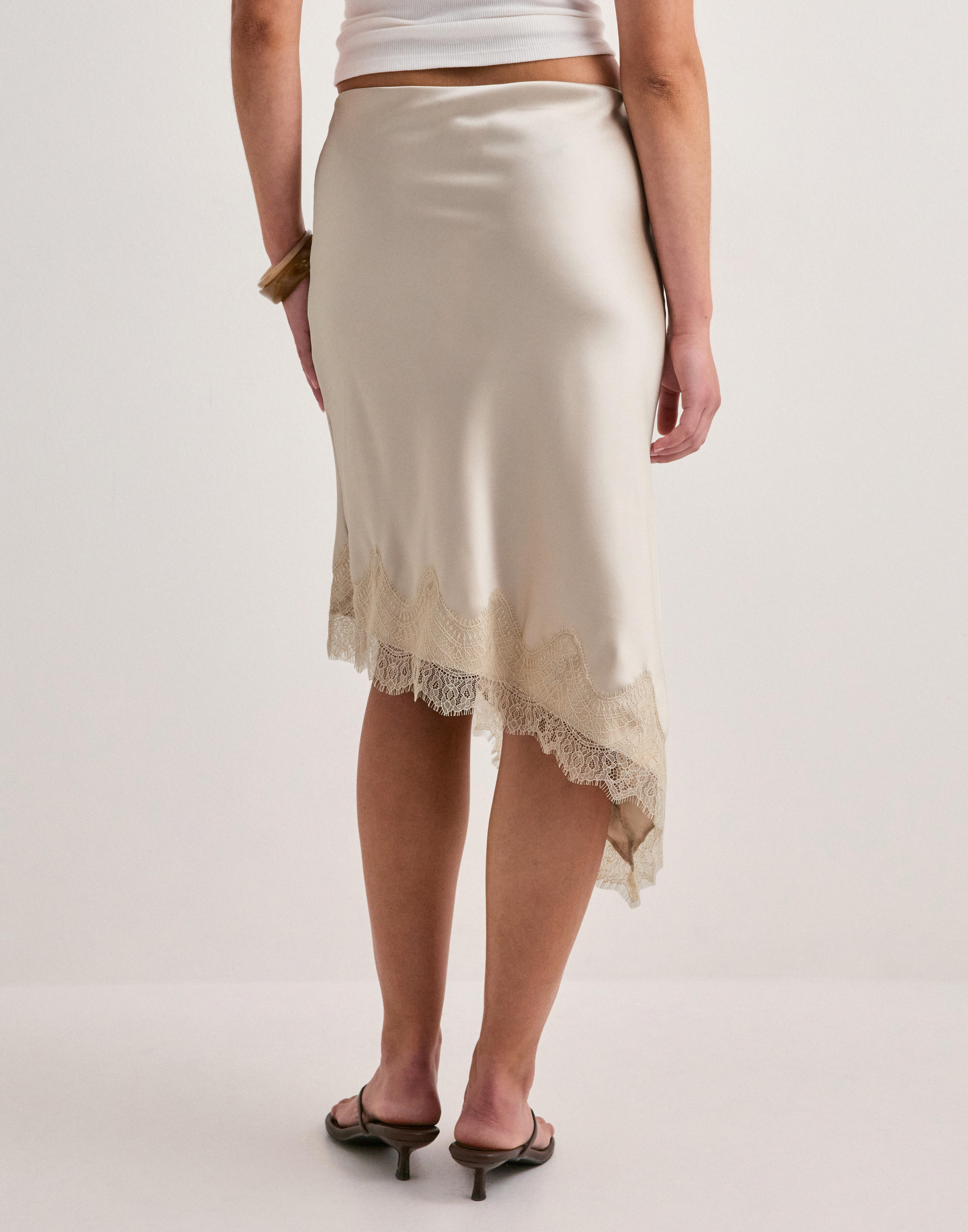 Buy Only ONLFARAYA SATIN LACE SKIRT WVN - Oatmeal | Nelly.com