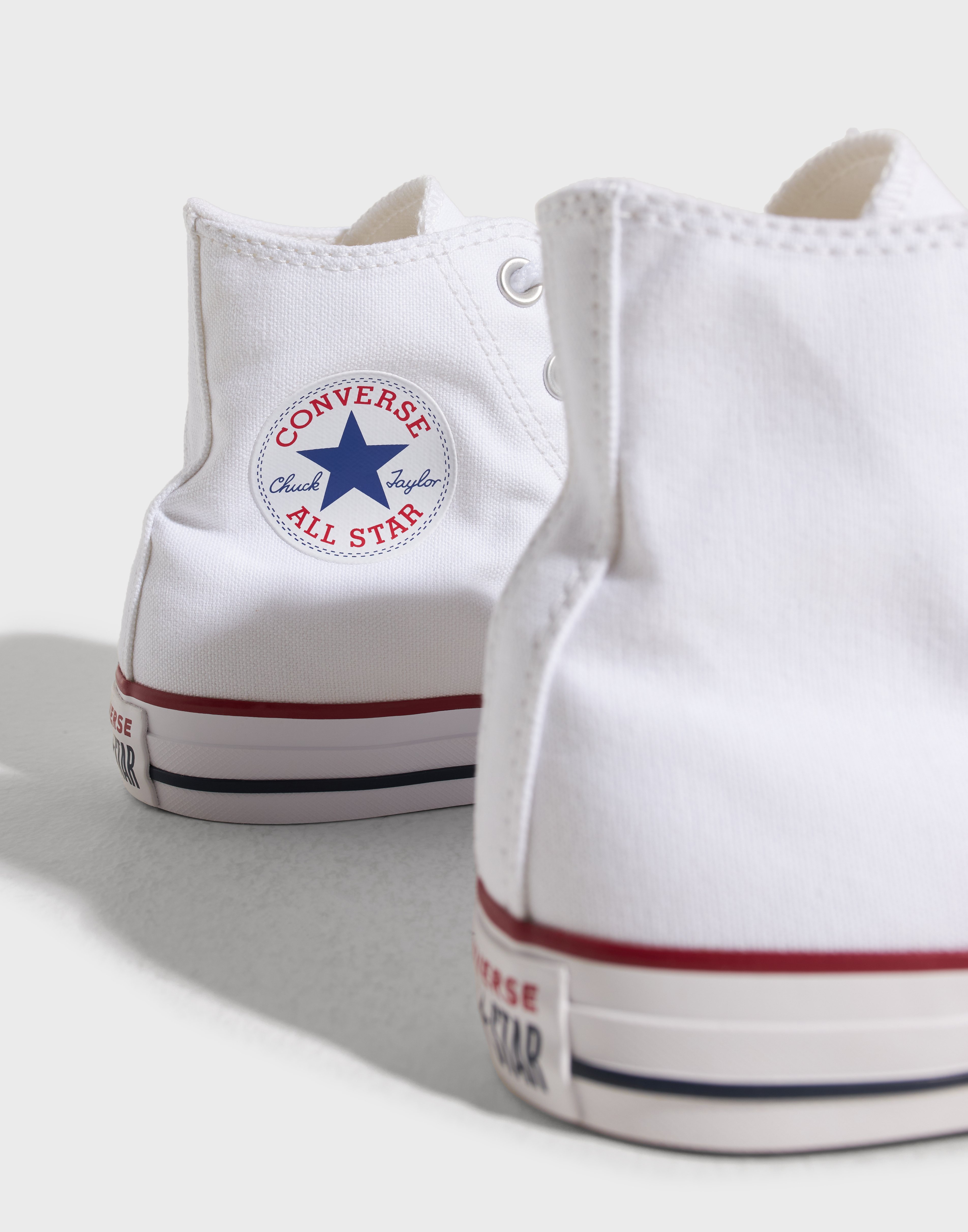 Converse all star hi canvas bianche best sale