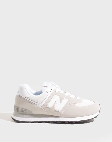 New Balance 574 chunky sneakers i beige i mocka och textil med logga på sidan