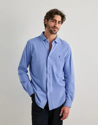 Polo Ralph Lauren blå skjorta i lätt mesh med logga på bröstet