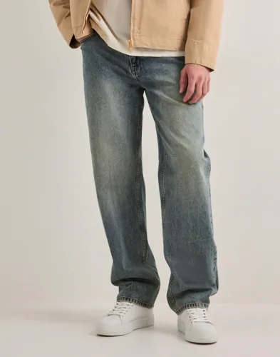 Woodbird Leroy blå straight jeans med femficksdesign