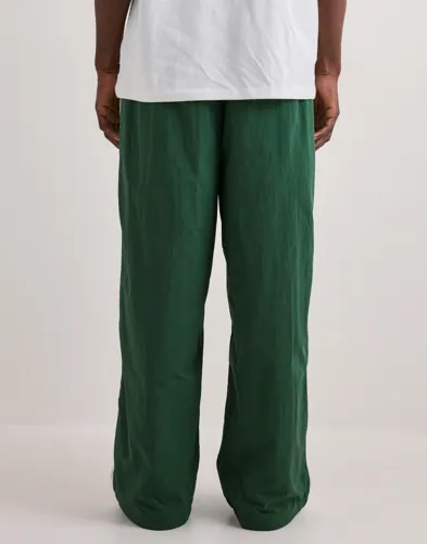 NIKE M Nk Club Ath Trk Pant Ncc Slacks casual byxor herr – bild 3
