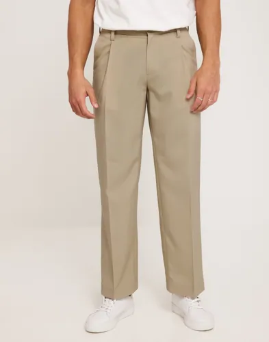 Beige Jack & Jones Bill wide chinos med pressveck