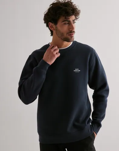 Blå sweatshirt från Mads Nørgaard med printad logga på bröstet