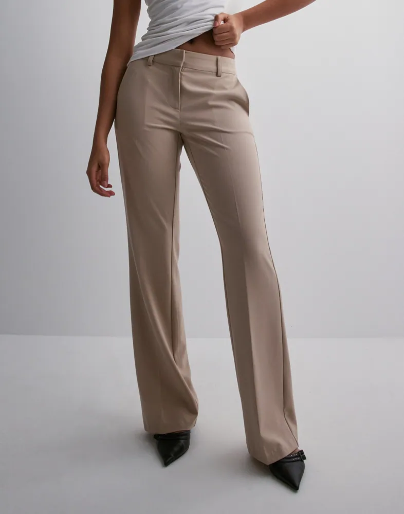 Buy Nelly Low Waist Flare Suit Pants - Beige | Nelly.com Buy Nelly Low Waist Flare Suit Pants - Beige | Nelly.com