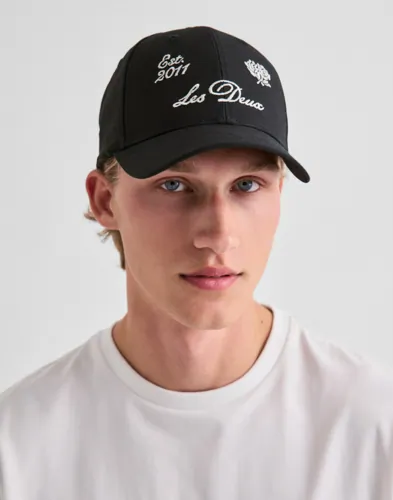 Les Deux svart baseballkeps med logga framtill