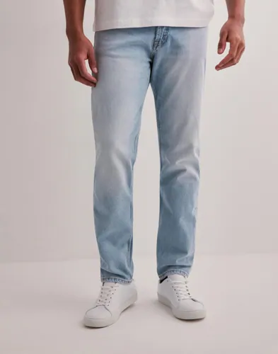 Blå Dr Denim Rush straight jeans med femficksdesign
