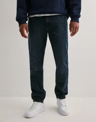 Blå slim fit jeans från Jack & Jones med femficksdesign