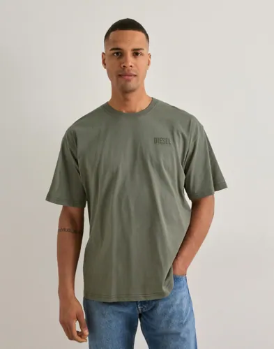 Grön Diesel t-shirt med rund hals och tryck på bröstet