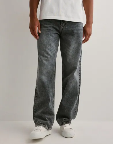Gråa Woodbird Rami Shadow jeans med wide fit och fem fickor