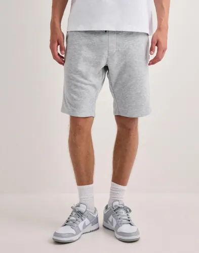 Gråa mjukisshorts från Jack & Jones med dragsko och fickor