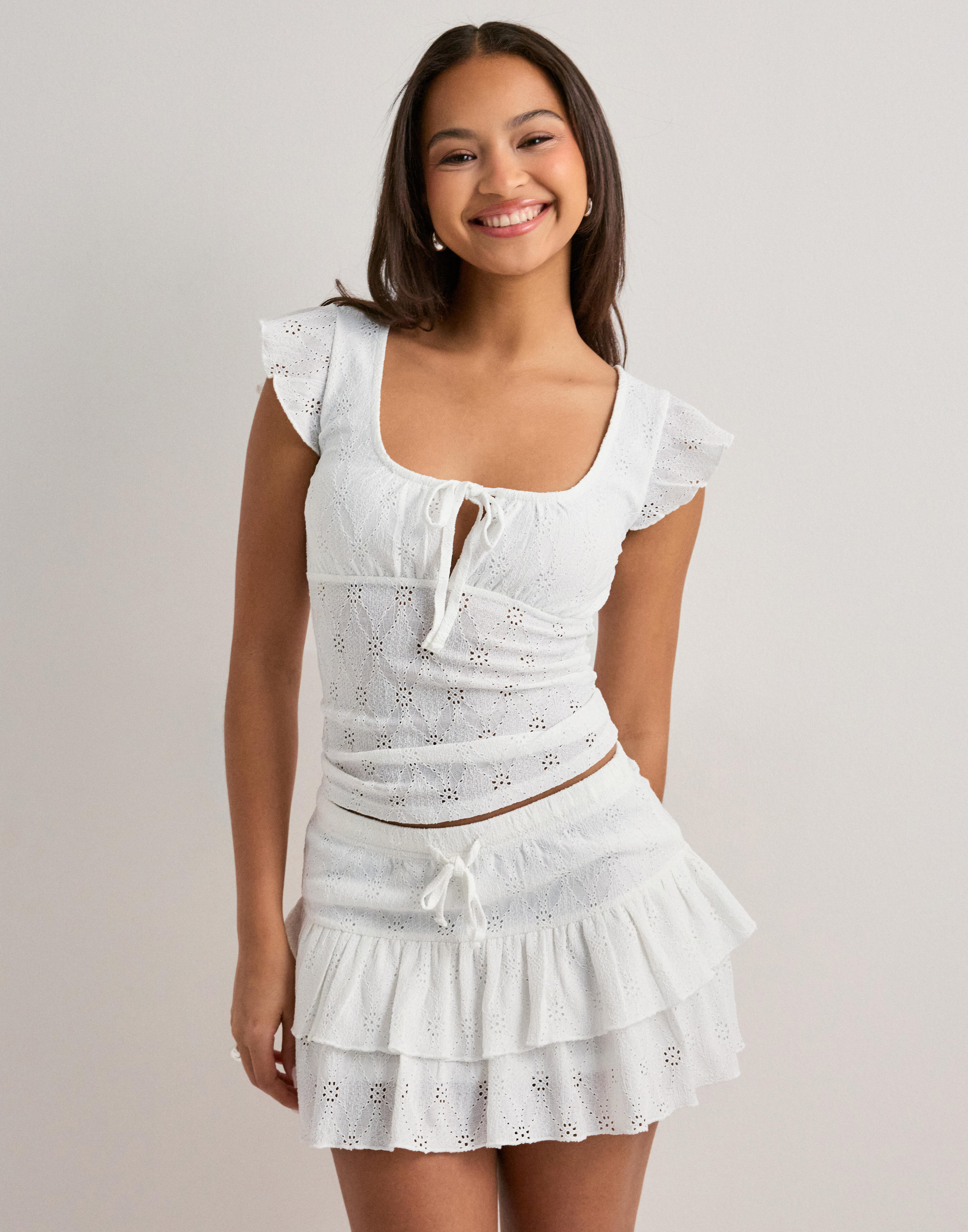 Buy Nelly Broderie Anglais Mini Skirt - White | Nelly.com