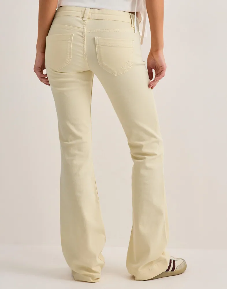Super Low Heart Pocket Bootcut Jeans